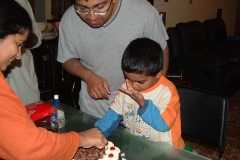 Amaran tasting the cake